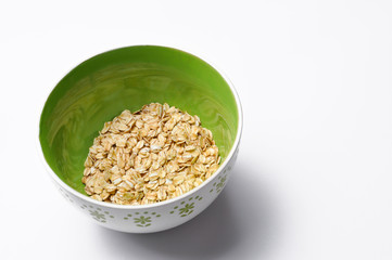Healthy breakfast. Grain in  gree bowl isolated on white background