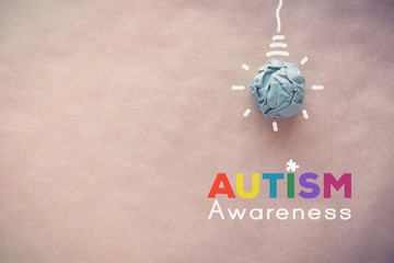 Blue paper light bulb , world Autism awareness day