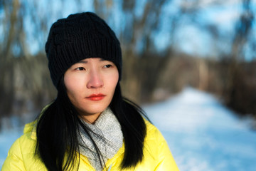 chinese woman looking away from camera