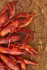 Crawfish cooked and served on wooden background