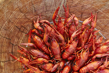 Crawfish cooked and served on wooden background