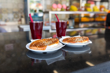 Traditional turkish drink turnip juice (Salgam) and turkish bagel