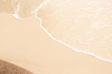 Tropical beach background with soft wave and sand
