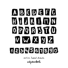 Vector alphabet,on a background of pieces of paper,painted by brush,hand drawn. Calligraphy, lettering.