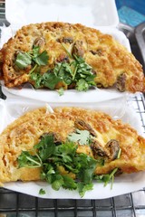 Fried clams crispy with omelet is delicious