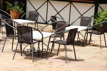 Set chairs of vintage style in garden