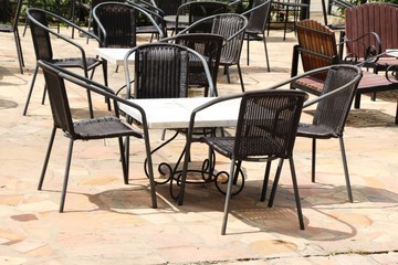 Set chairs of vintage style in garden