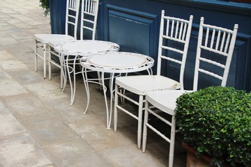 Set chairs of vintage style in garden