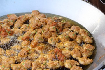 Making fried fish cake in the pan