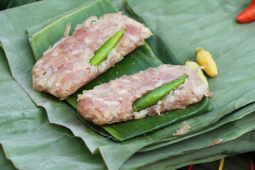 Sour pork wrapped in banana leaves delicious.