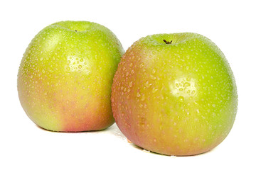 apples with water drops on a white background