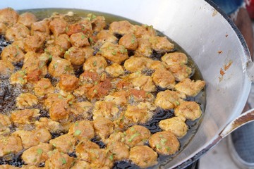 Making fried fish cake in the pan
