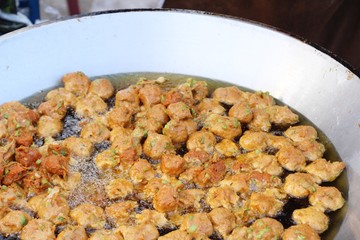 Making fried fish cake in the pan