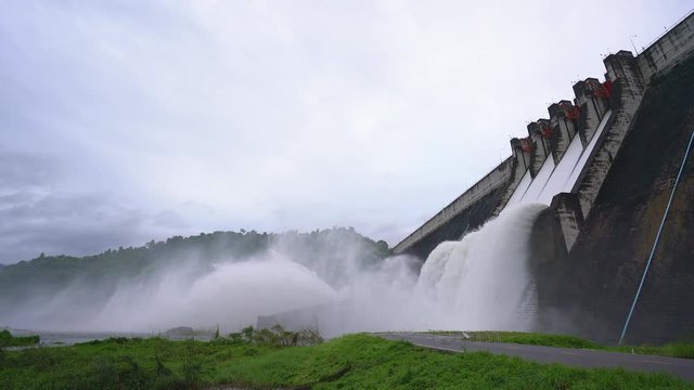 Dam with floodgate, Dam with water overflow, Spillway on the Khun Dan Prakan Chon Dam in thailand.