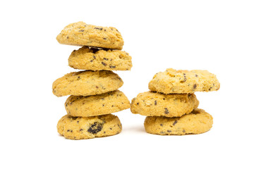 butter cookies with cashew nuts at eye level. isolated on white background