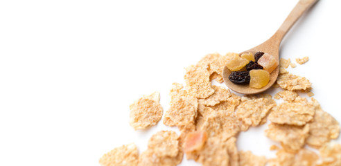 whole grain cereal flakes which mixed berry fruit and raisins for breakfast isolaed on white background