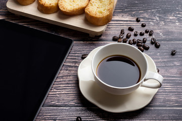 Cup of coffee with garlic bread