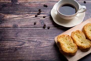 Cup of coffee with garlic bread