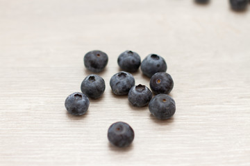 blueberry on white wooden background
