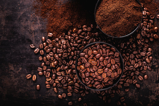 Coffee beans, ground coffee and instant coffee on a dark background