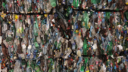 Plastic bales of garbage at the waste processing plant. Processing and storage of waste for further disposal.