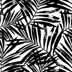 Hand painted black palm leaves on white background.