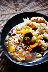 Sweet sour sauce with fried rice cake