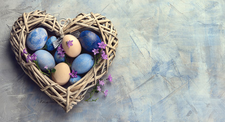 Easter eggs in heart shaped nest