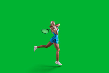 Fototapeta na wymiar Girl tennis player on green background.