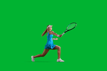 Girl tennis player on green background.