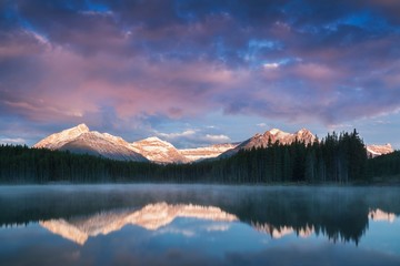 Lake Herbert panorama in a foggy morning with glaciers mountain and reflection in Banff National...