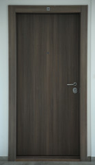 Entrance door to a condo, inside of a building