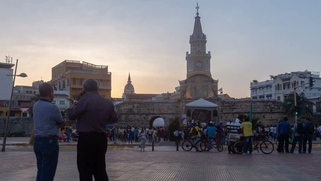 Timelapse of unidentified people gathering for a Champeta music concert at the bell tower in Cartagena, Colombia on May 16, 2016.