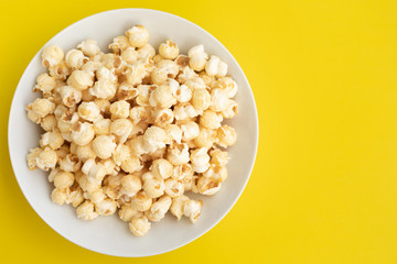 Pop corn on pastel color background.Food and snack concepts ideas.Minimal