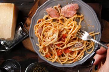 Pasta with chunks of fresh tuna, tomato and capers