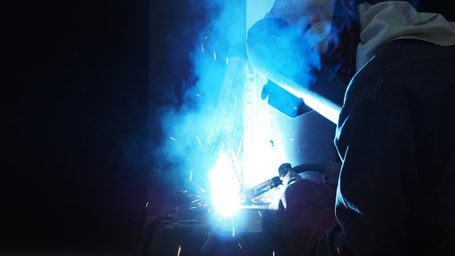 Welder Is Welding Flux Cored Arc Welding ,Industrial Welding Part In Oil And Gas Or Petrochemical