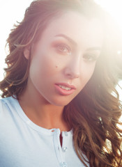 Outdoor closeup portrait of a pretty young girl