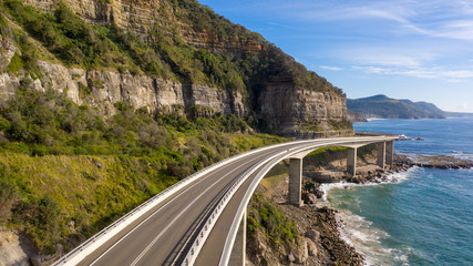 Travelling on the sea cliff bridge coastal drivel along the pacific ocean. Grand pacific drive,...