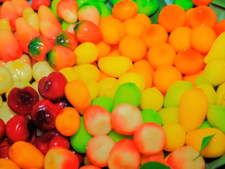 Thai traditional dessert Khanom Luk Chup (made of mung beans, coconut milk, sugar, gelatin and natural coloring. Shaped into cute fruits and vegetables.