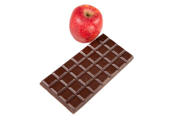 weight concept with red apple vs chocolate bar