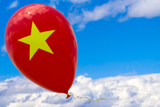 Balloon with the image of the national flag of Vietnam, flying through the blue sky. 3D rendering, illustration with copy space.