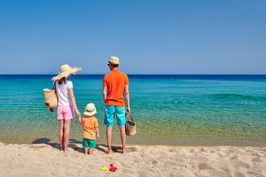 Family On Beach In Greece