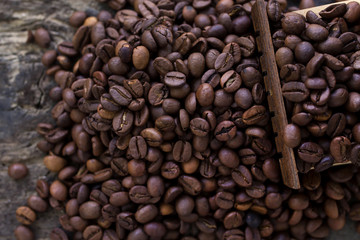 Roasted coffee beans. Food and drink background. Top view.