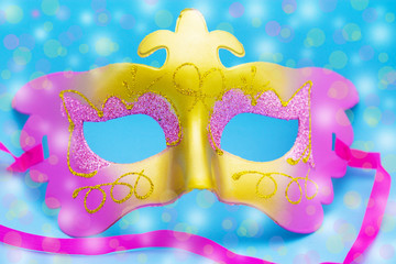 carnival mask with blue background