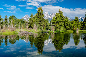 Mountains in Grand Teton National Park with reflection in Snake River