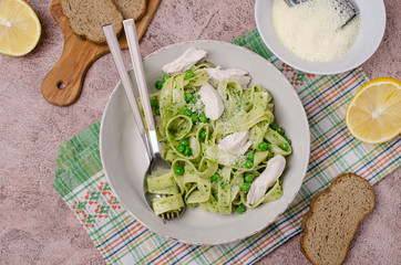 Fettuccine pasta with meat slices