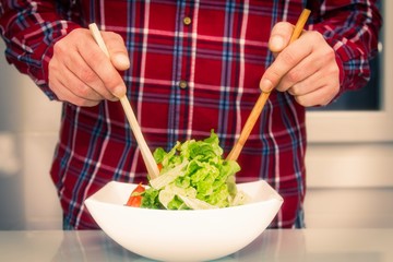 preparing vegetable salad, concept of diet and food