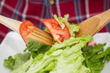 preparing vegetable salad, concept of diet and food