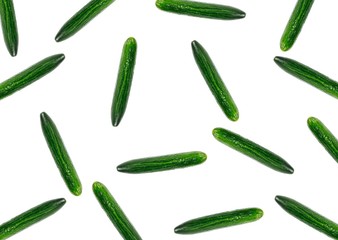 Pattern of fresh whole cucumber. Close up. Top view. Isolated on white background
