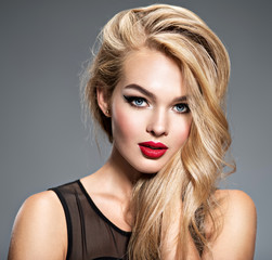 Portrait of  a  beautiful  woman with long white straight  hair